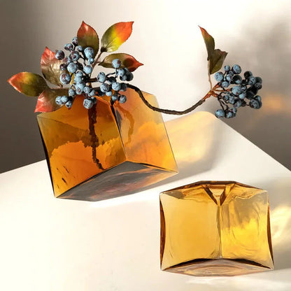 Amber cube glass vase with geometric design, perfect for modern floral arrangements – Bea Homes.
